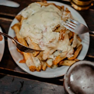 Papas Fritas Cuatro Quesos