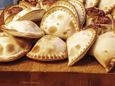 12 Empanadas + 1 Bebida 1.5L